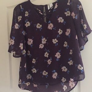 Purple blouse with criss cross neck line